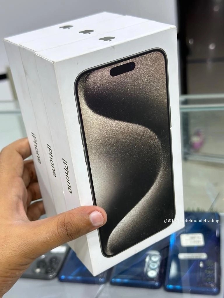 Stack of genuine iPhone boxes at Confidence Gadgets